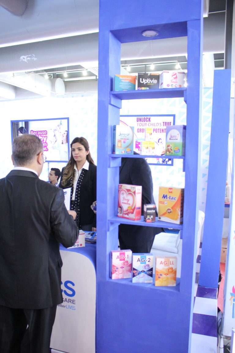 team setting up supplements at exhibition
