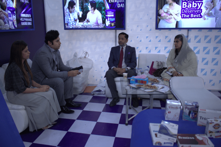 Inovics Healthcare team engaging visitors